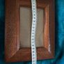 Hand-carved vintage wooden picture frame with a natural grain finish. Image 8