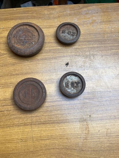 8 old scales weighs