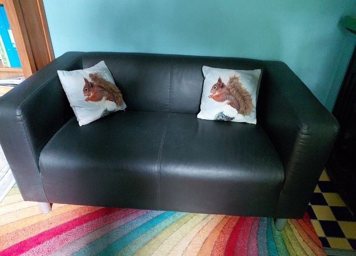 Small leatherette sofa