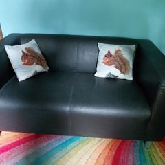 Small leatherette sofa