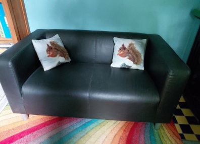 Small leatherette sofa
