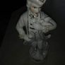Lovely Figurine of Gentlemen with bird and violent Image 2