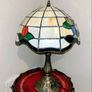 Tiffany-style stained glass table lamp featuring a floral motif Image 2