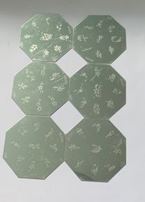 Nail stamping plates
