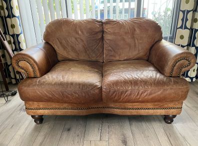 Two seater tan leather sofa
