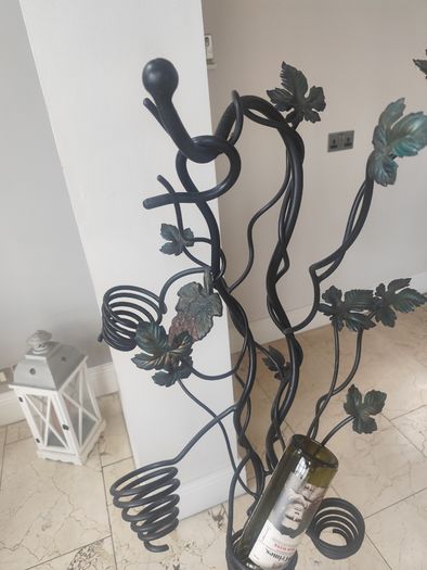 Wrought iron freestanding wine rack