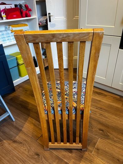 Solid oak dining table & 6 reupholstered dining chairs