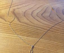 gold chain and cross