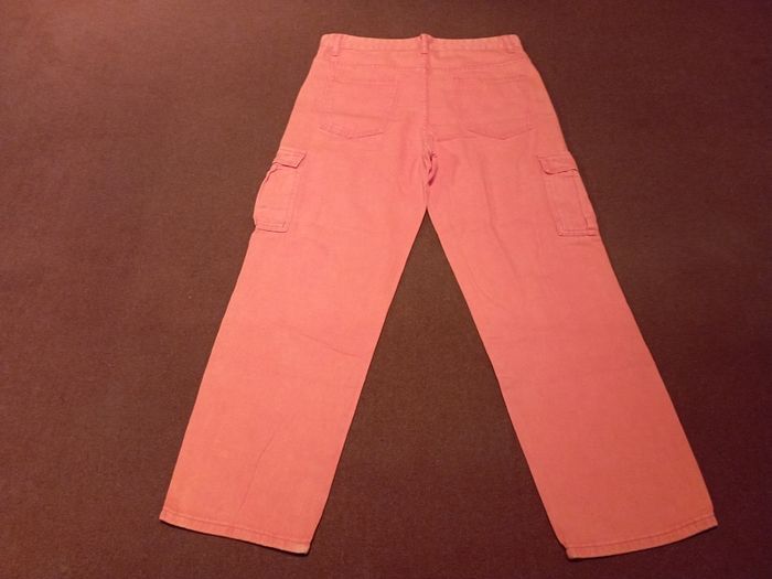 Orange cargo trousers.
