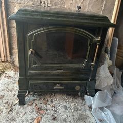 Oil stove with back boiler