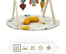 wooden baby gym and mat