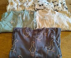 5 boys Next Babygrows.