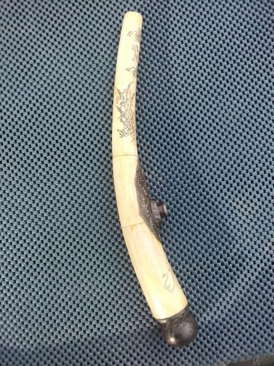 Carved walrus tusk