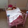 Our Generation Dolls Bundle & Pink Metal Doll Cot with Bedding. Unwanted present for grandchild who is too old to play with them. Image 3