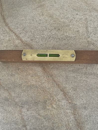 Vintage wooden and brass spirit level