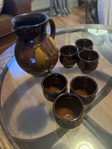 Pottery jug and goblets