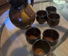 Pottery jug and goblets