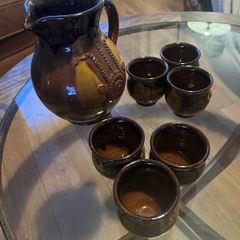 Pottery jug and goblets