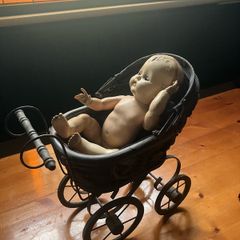 pram and baby doll