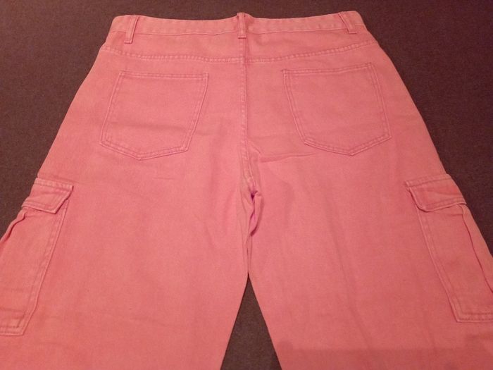 Orange cargo trousers.
