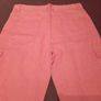 Orange cargo trousers. Image 6