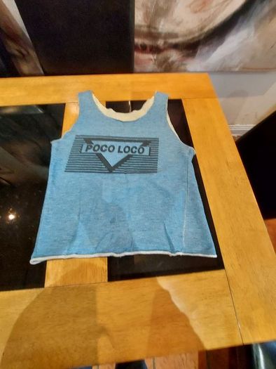 Poco  Loco  Sleeveless  T-Shirt .