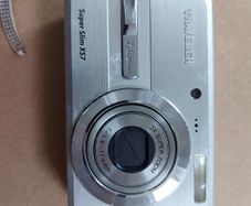 Super Slim X57 Traveler Digital Camera, in excellent condition, unique charging port and have no charger to test