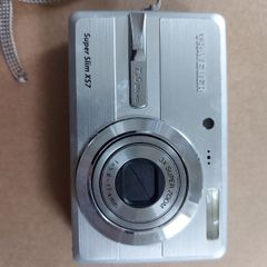 Super Slim X57 Traveler Digital Camera, in excellent condition, unique charging port and have no charger to test