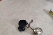 Tea Strainer, Novelty Funny On Chain with small holder.