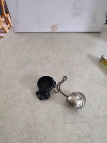 Tea Strainer, Novelty Funny On Chain with small holder.