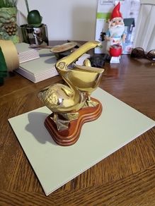 Brass pelican ornament