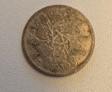 1930 British Six Pence coin featuring King George V