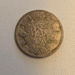 1930 British Six Pence coin featuring King George V