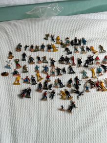 Collection of vintage toy figures trains