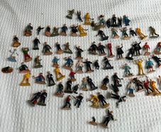 Collection of vintage toy figures trains