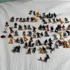 Collection of vintage toy figures trains