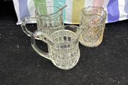 3 Assorted glass milk jugs