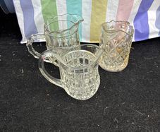 3 Assorted glass milk jugs