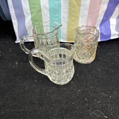 3 Assorted glass milk jugs