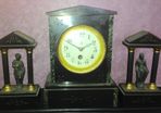 Antique polished slate mantel clock.