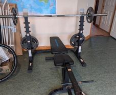 squat rack, bench and weights