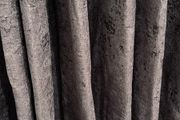 Grey curtains with extensible curtain pole