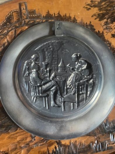 Vintage pewter wall hanging plates