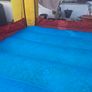 Happy Hop clown-themed bouncy castle with blower Image 8