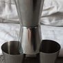 four white metal shot cup's in leather case Image 3