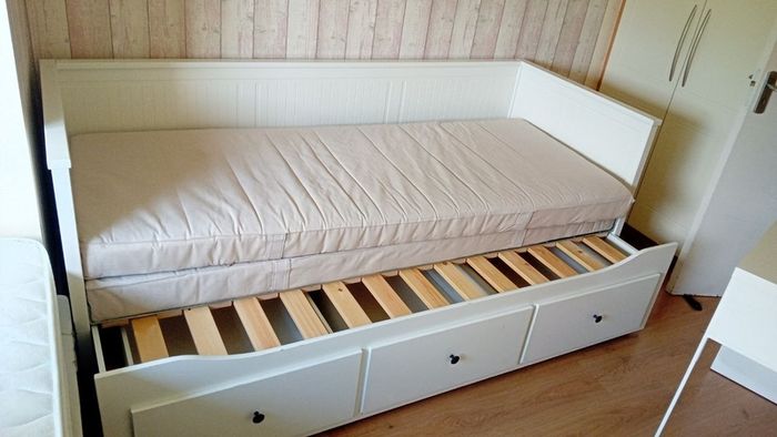 Ikea Hemnes bed, secound bed pulls out.