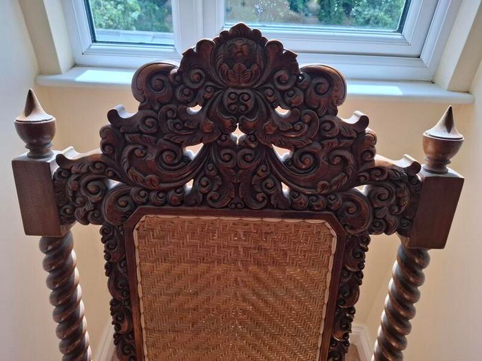 Hand Carved highly ornate Hardwood Rocking chair