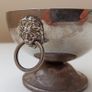 Small silver plated bowl with handles cast as lion's head holding a ring Image 3