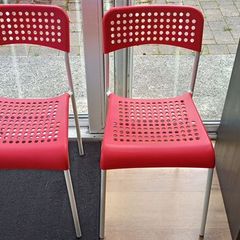 2 IKEA Adde chairs in red