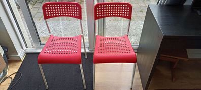 2 IKEA Adde chairs in red